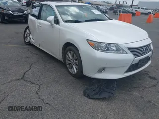 2014 Lexus ES 300h z VIN JTHBW1GG2E2050313, wystawiony jako IAAI lot #42145939 z przebiegiem 114 143 mil mil oraz . Historia ofert i sprzedaży dostępna na DreamBid. Obrazek 1.