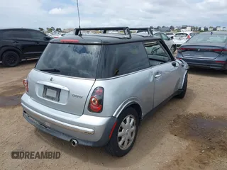 2004 MINI Hardtop with VIN WMWRC33434TJ57506, listed as a IAAI auction lot 42117581 with 148,483 mi miles and . Bid and sale history available at DreamBid. Image 4.