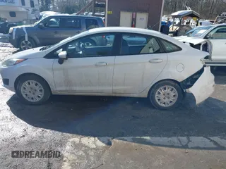 2014 Ford Fiesta S z VIN 3FADP4AJ4EM125475, wystawiony jako IAAI lot #41697578 z przebiegiem 160 189 mil mil oraz . Historia ofert i sprzedaży dostępna na DreamBid. Obrazek 14.
