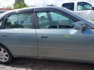 2001 Toyota Avalon XL z VIN 4T1BF28B01U138040, wystawiony jako IAAI lot #42320480 z przebiegiem 220 086 mil mil oraz . Historia ofert i sprzedaży dostępna na DreamBid. Obrazek 13.