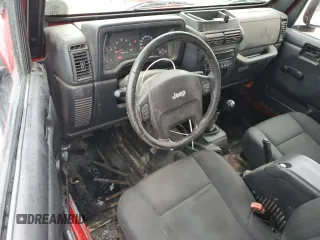2006 Jeep Wrangler X с VIN 1J4FA39S06P766687, выставлен на аукционе Copart как лот 55791365 с пробегом 220 712 миль миль и Списание • Salvage title. История ставок и продаж доступна на DreamBid. Изображение 8.