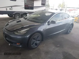 2020 Tesla Model 3 Standard Range Plus with VIN 5YJ3E1EA8LF743405, listed as a IAAI auction lot 41923592 with 81,901 mi miles. Bid and sale history available at carsss.com. Image 17.