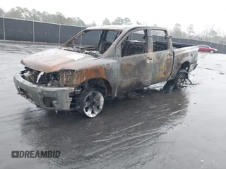 2007 Nissan Titan SE with VIN 1N6BA07A77N236353, listed as a IAAI auction lot 41531216 with 130,000 mi miles and . Bid and sale history available at DreamBid. Image 2.
