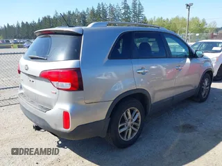 2014 Kia Sorento LX with VIN 5XYKTDA68EG481238, listed as a IAAI auction lot 42055425 with 106,248 mi miles. Bid and sale history available at carsss.com. Image 4.