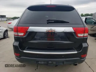 2013 Jeep Grand Cherokee Overland with VIN 1C4RJECG5DC528650, listed as a Copart auction lot 51581684 with 141,050 mi miles and Clean Title. Bid and sale history available at carsss.com. Image 6.