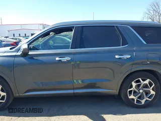 2022 Hyundai Palisade Calligraphy z VIN KM8R7DHE6NU407925, wystawiony jako IAAI lot #41737020 z przebiegiem 50 074 mil mil oraz . Historia ofert i sprzedaży dostępna na DreamBid. Obrazek 14.