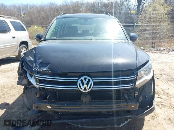 2017 Volkswagen Tiguan S with VIN WVGBV7AX9HK039244, listed as a IAAI auction lot 42050325 with 70,828 mi miles and . Bid and sale history available at DreamBid. Image 6.