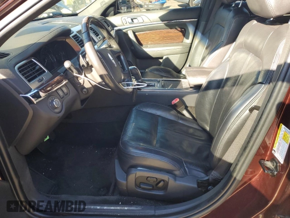 2012 Lincoln MKS with VIN 1LNHL9ER2CG802577, listed as a Copart auction lot 85455164 with 121,169 mi miles and Salvage Title. Bid and sale history available at DreamBid. Image 7.