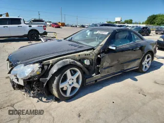 2008 Mercedes-Benz SL 55/63 AMG with VIN WDBSK72F28F139681, listed as a Copart auction lot 62983015 with 99,720 mi miles and Salvage title. Bid and sale history available at DreamBid. Image 1.