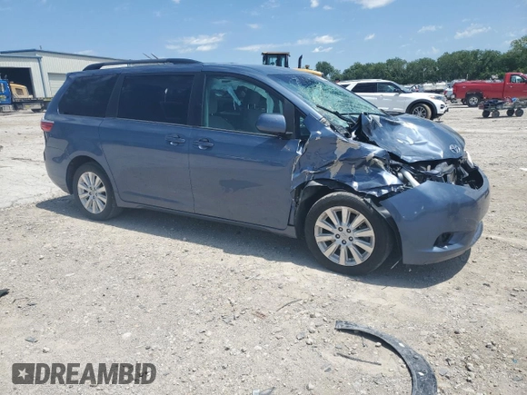 2015 Toyota Sienna LE with VIN 5TDJK3DC4FS107711, listed as a Copart auction lot 57693005 with 141,370 mi miles and Salvage title. Bid and sale history available at DreamBid. Image 4.