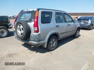 2003 Honda CR-V LX z VIN JHLRD68453C004928, wystawiony jako IAAI lot #42452176 z przebiegiem 258 092 mil mil oraz . Historia ofert i sprzedaży dostępna na DreamBid. Obrazek 4.