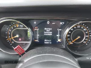 2021 Jeep Wrangler Unlimited Sport Altitude with VIN 1C4HJXDG1MW603784, listed as a IAAI auction lot 41509231 with 102,567 mi miles and . Bid and sale history available at DreamBid. Image 7.