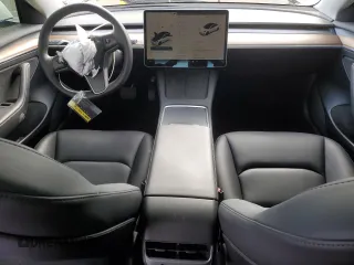 2023 Tesla Model 3 with VIN 5YJ3E1EA5PF486726, listed as a Copart auction lot 51659655 with 14,632 mi miles and Salvage title. Bid and sale history available at DreamBid. Image 8.