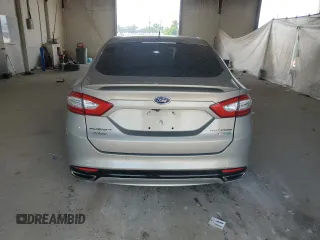 2016 Ford Fusion Titanium z VIN 3FA6P0K96GR117597, wystawiony jako Copart lot #62072525 z przebiegiem Nie podano mil oraz Czysty tytuł • Clean title. Historia ofert i sprzedaży dostępna na DreamBid. Obrazek 6.