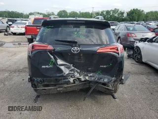 2018 Toyota RAV4 XLE with VIN 2T3WFREV3JW469307, listed as a Copart auction lot 57092295 with 47,639 mi miles and Salvage title. Bid and sale history available at DreamBid. Image 6.