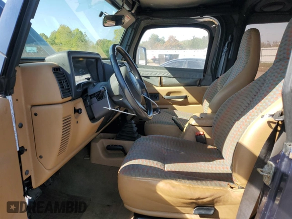 1997 Jeep Wrangler Sport with VIN 1J4FY19S0VP449796, listed as a Copart auction lot 74392904 with 139,322 mi miles and Clean Title. Bid and sale history available at carsss.com. Image 7.