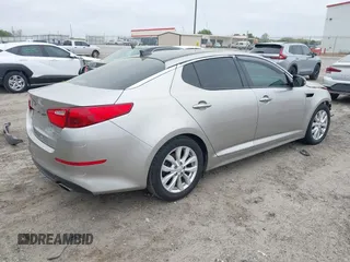 2015 Kia Optima EX with VIN 5XXGN4A76FG409159, listed as a IAAI auction lot 41937814 with 120,641 mi miles. Bid and sale history available at carsss.com. Image 4.