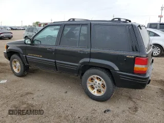 1997 Jeep Grand Cherokee Limited z VIN 1J4GZ78Y8VC586034, wystawiony jako Copart lot #58061705 z przebiegiem 244 355 mil mil oraz Czysty tytuł • Clean title. Historia ofert i sprzedaży dostępna na DreamBid. Obrazek 2.