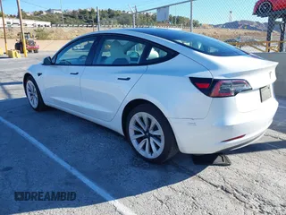 2023 Tesla Model 3 with VIN 5YJ3E1EAXPF486639, listed as a IAAI auction lot 41387797 with 18,603 mi miles and . Bid and sale history available at carsss.com. Image 3.