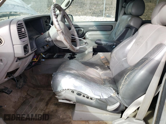 1999 GMC Denali with VIN 1GKEK13R0XR915053, listed as a Copart auction lot 49241145 with 2,664,121 mi miles and Salvage Title. Bid and sale history available at carsss.com. Image 7.