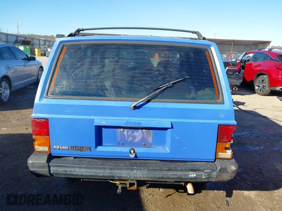 1996 Jeep Cherokee Sport with VIN 1J4FJ68S6TL171428, listed as a IAAI auction lot 40881632 with 323,289 mi miles. Bid and sale history available at carsss.com. Image 16.