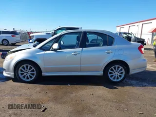 2009 Suzuki SX4 Man Sport FWD with VIN JS2YC414596200374, listed as a IAAI auction lot 41429760 with 134,611 mi miles. Bid and sale history available at carsss.com. Image 14.