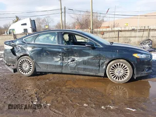 2014 Ford Fusion Titanium with VIN 3FA6P0K90ER336116, listed as a IAAI auction lot 41559792 with 132,852 mi miles. Bid and sale history available at carsss.com. Image 13.