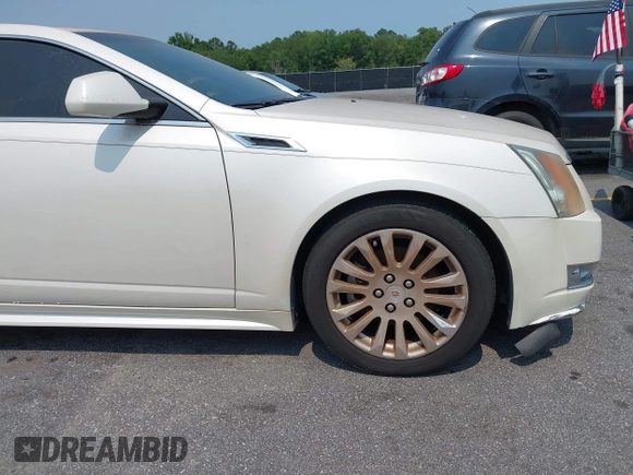 2012 Cadillac CTS Premium z VIN 1G6DP1E3XC0108543, wystawiony jako IAAI lot #42413547 z przebiegiem 80 570 mil mil oraz . Historia ofert i sprzedaży dostępna na DreamBid. Obrazek 12.
