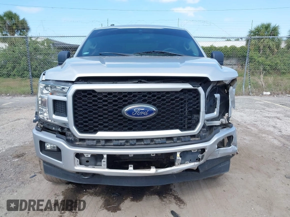 2019 Ford F-150 XL with VIN 1FTEW1E55KKC58276, listed as a IAAI auction lot 42133235 with 97,032 mi miles. Bid and sale history available at carsss.com. Image 12.