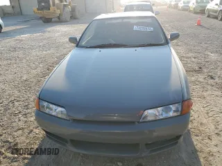 1992 Nissan Skyline z VIN HNR32035831, wystawiony jako Copart lot #74228974 z przebiegiem 49 082 mil mil oraz Szkoda całkowita • Salvage title. Historia ofert i sprzedaży dostępna na DreamBid. Obrazek 5.