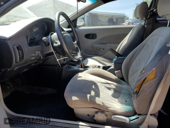 2001 Saturn SC with VIN 1G8ZR12701Z223174, listed as a Copart auction lot 52033445 with 234,079 mi miles and Salvage Title. Bid and sale history available at carsss.com. Image 7.