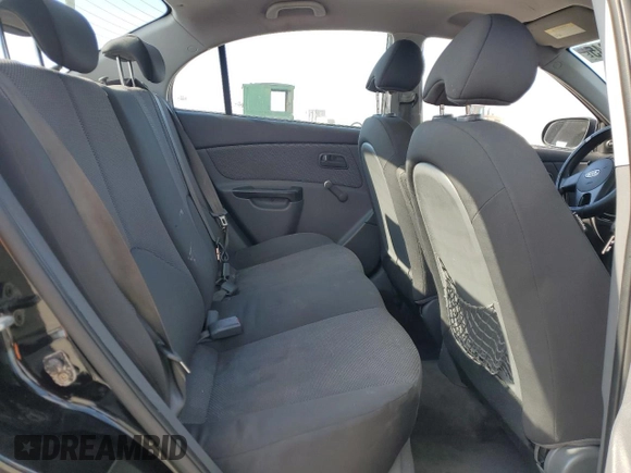 2010 Kia Rio LX with VIN KNADH4A3XA6652808, listed as a Copart auction lot 42597245 with 164,768 mi miles and Salvage Title. Bid and sale history available at carsss.com. Image 10.