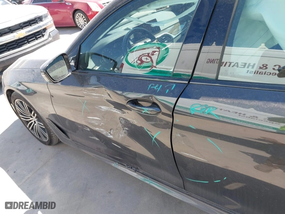 2019 BMW 5 Series 530i xDrive with VIN WBAJA7C50KG910479, listed as a IAAI auction lot 41802413 with 84,932 mi miles. Bid and sale history available at carsss.com. Image 17.