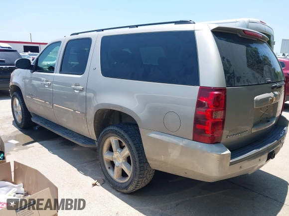 2007 Chevrolet Suburban LT with VIN 1GNFK16327J350303, listed as a IAAI auction lot 42413524 with 215,353 mi miles and . Bid and sale history available at DreamBid. Image 3.