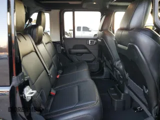 2024 Jeep Wrangler Sahara with VIN 1C4PJXENXRW118401, listed as a Copart auction lot 84731534 with 6,895 mi miles and Salvage Title. Bid and sale history available at DreamBid. Image 10.