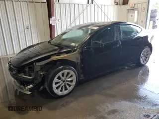 2023 Tesla Model 3 z VIN 5YJ3E1EA1PF450693, wystawiony jako Copart lot #63134005 z przebiegiem 65 116 mil mil oraz Czysty tytuł • Clean title. Historia ofert i sprzedaży dostępna na DreamBid. Obrazek 1.