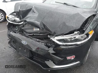 2018 Ford Fusion Energi SE with VIN 3FA6P0PU2JR277481, listed as a IAAI auction lot 41778140 with 51,933 mi miles. Bid and sale history available at carsss.com. Image 6.