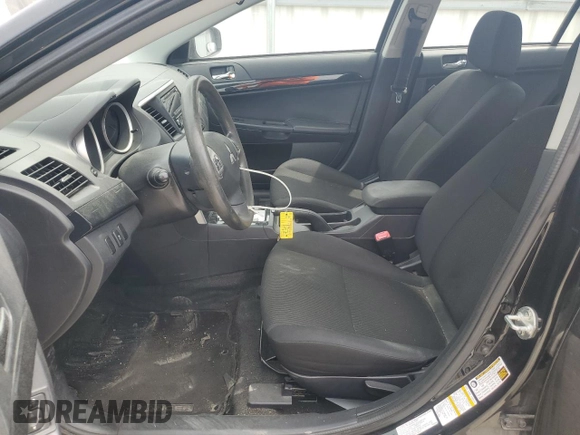 2016 Mitsubishi Lancer ES with VIN JA32U2FU5GU009149, listed as a Copart auction lot 60899235 with 124,644 mi miles and Salvage title. Bid and sale history available at DreamBid. Image 7.