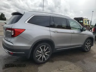 2019 Honda Pilot Touring 8-Passenger z VIN 5FNYF5H91KB033661, wystawiony jako Copart lot #56650155 z przebiegiem 73 512 mil mil oraz Szkoda całkowita • Salvage title. Historia ofert i sprzedaży dostępna na DreamBid. Obrazek 3.