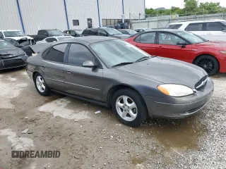 2003 Ford Taurus SES Standard with VIN 1FAFP55213G215000, listed as a Copart auction lot 59596615 with 170,929 mi miles and Non repairable. Bid and sale history available at DreamBid. Image 4.