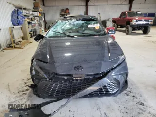 2025 Toyota Camry LE with VIN 4T1DAACK9SU556042, listed as a Copart auction lot 46990605 with 10,468 mi miles and Salvage Title. Bid and sale history available at DreamBid. Image 5.