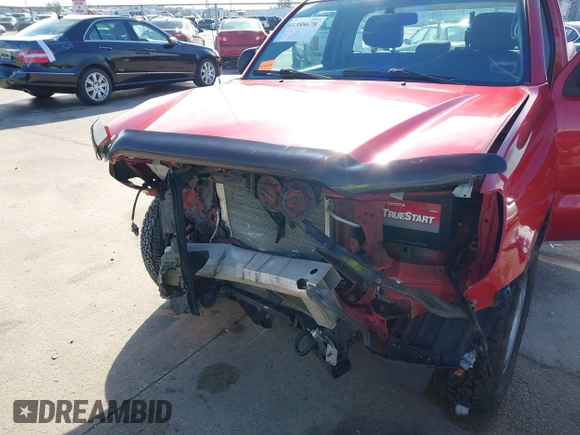2014 Toyota Tacoma with VIN 5TFNX4CN0EX033496, listed as a IAAI auction lot 41388678 with 190,596 mi miles and . Bid and sale history available at DreamBid. Image 6.
