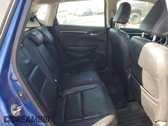 2015 Honda Fit EX-L z VIN 3HGGK5H8XFM785764, wystawiony jako Copart lot #52246635 z przebiegiem 308 947 mil mil oraz Czysty tytuł • Clean title. Historia ofert i sprzedaży dostępna na DreamBid. Obrazek 10.