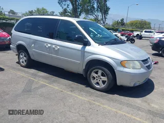 2005 Dodge Caravan SXT with VIN 2D4GP44L25R401250, listed as a IAAI auction lot 42544407 with 91,835 mi miles and . Bid and sale history available at DreamBid. Image 1.