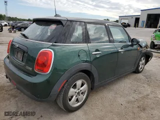 2017 MINI Hardtop 4 Door Cooper with VIN WMWXU1C57H2E18281, listed as a Copart auction lot 69714554 with 77,049 mi miles and Salvage Title. Bid and sale history available at carsss.com. Image 3.