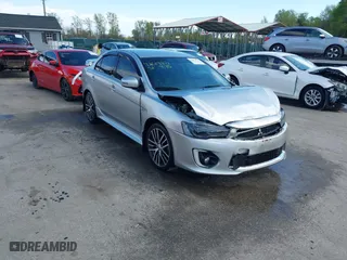 2017 Mitsubishi Lancer ES with VIN JA32V2FW9HU000485, listed as a IAAI auction lot 42019371 with 101,922 mi miles. Bid and sale history available at carsss.com. Image 1.