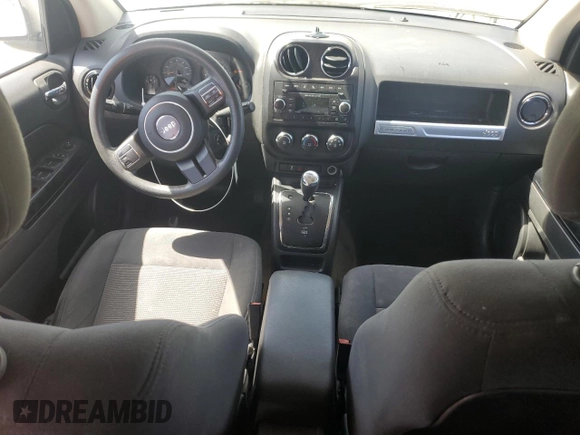 2016 Jeep Compass Sport с VIN 1C4NJCBAXGD525774, выставлен на аукционе Copart как лот 58432815 с пробегом 129 430 миль миль и Списание • Salvage title. История ставок и продаж доступна на DreamBid. Изображение 8.