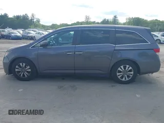 2015 Honda Odyssey EX-L z VIN 5FNRL5H69FB060423, wystawiony jako IAAI lot #42335707 z przebiegiem 175 770 mil mil oraz . Historia ofert i sprzedaży dostępna na DreamBid. Obrazek 14.