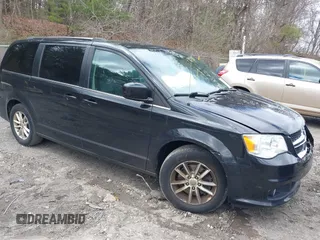 2019 Dodge Grand Caravan SXT with VIN 2C4RDGCG9KR804867, listed as a IAAI auction lot 42032311 with 157,351 mi miles and . Bid and sale history available at DreamBid. Image 1.