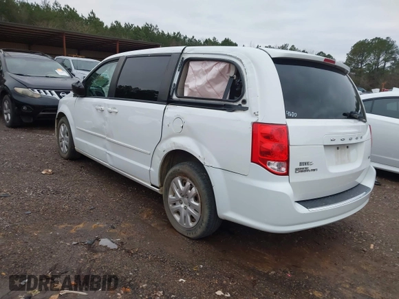 2017 Dodge Grand Caravan SE with VIN 2C4RDGBG9HR824594, listed as a IAAI auction lot 41250877 with 117,588 mi miles and . Bid and sale history available at DreamBid. Image 3.